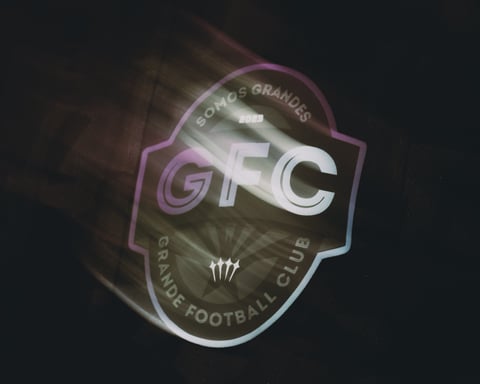 GFC Solos Grandes logo badge with purple and white neon styling on dark background